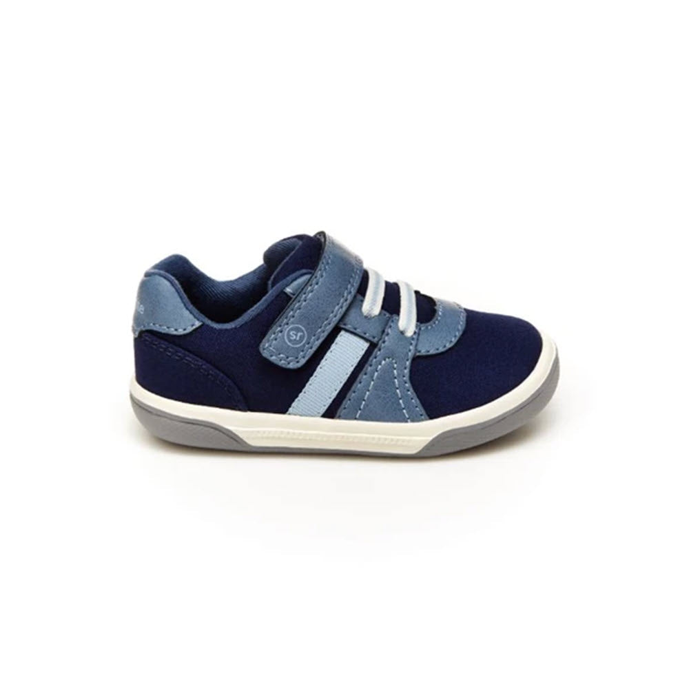 A single blue and grey toddler&#39;s Stride Rite Thompson Navy Sneaker featuring a memory foam interior, isolated on a white background.