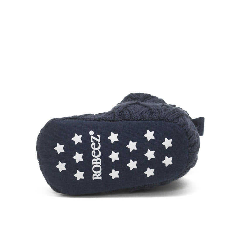 Navy blue Robeez Snap Booties with white stars and a sweater knit detail.