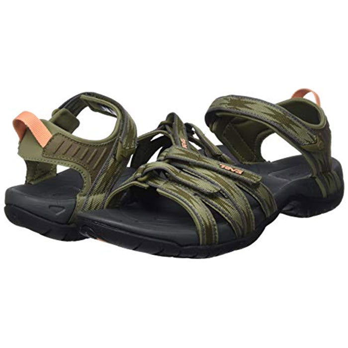 A pair of green and black strappy Teva Tirra sports sandals on a white background. 
replaced with: A pair of green and black strappy Teva Tirra Halcon Burnt Olive - Womens sports sandals on a white background.