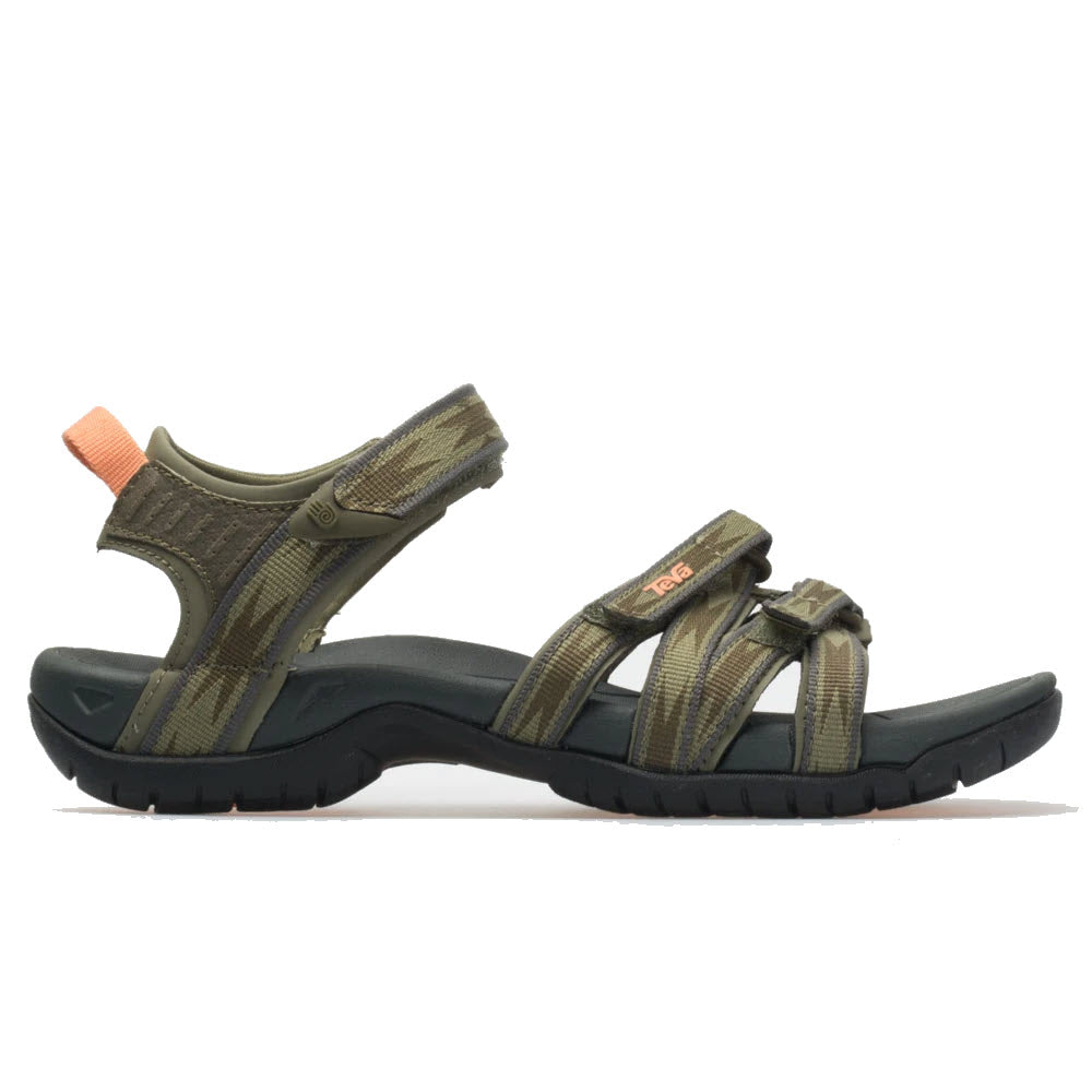 A pair of burnt olive Teva Tirra Halcon sports sandals with adjustable straps on a white background, ideal as women&#39;s water shoes.