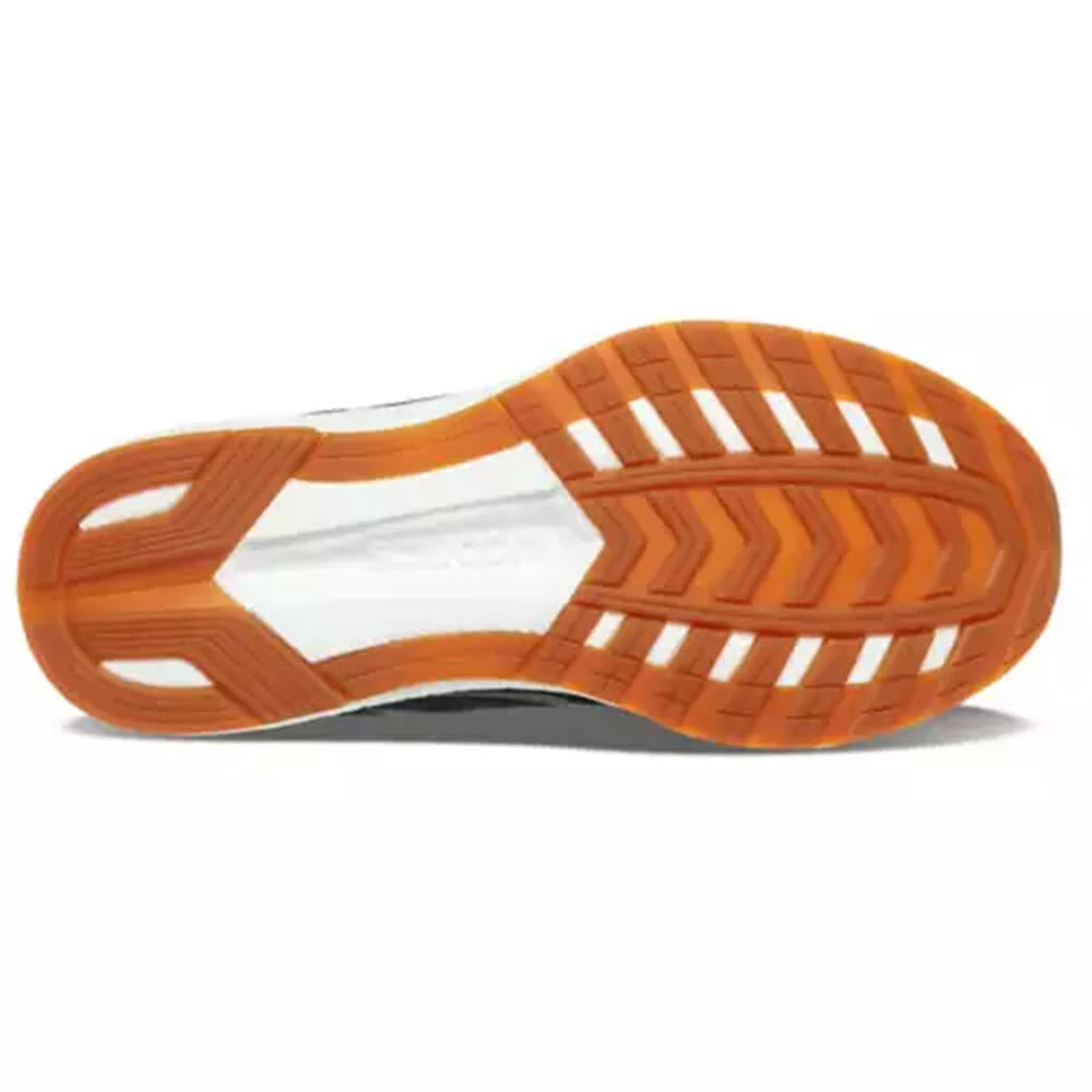 The sole of a Saucony Freedom 5 Womens Black/Gum - Womens vegan crossover shoe with an orange tread pattern.