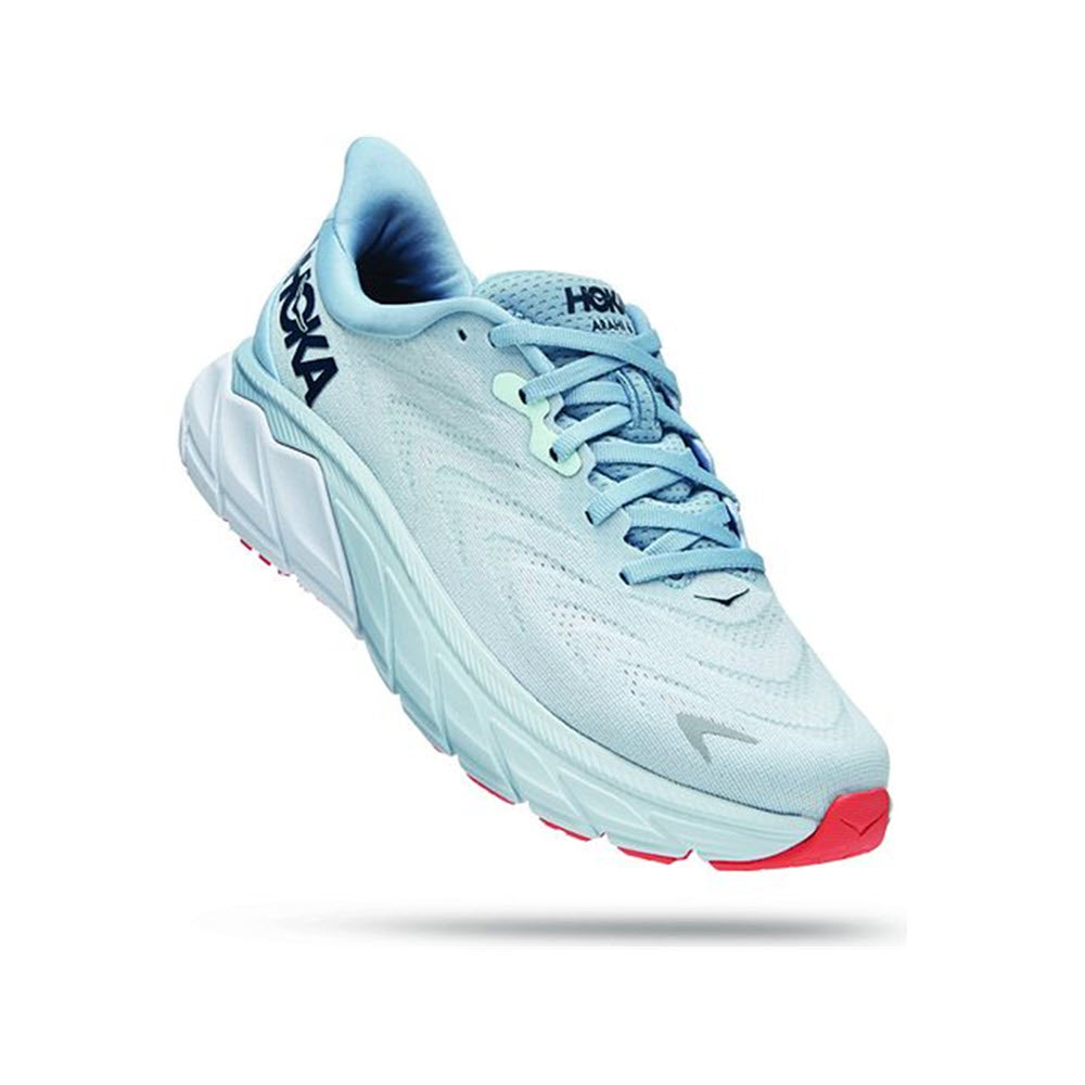 A light blue and white stability running shoe with the HOKA ONE ONE ARAHI 6 PLEIN AIR/BLUE FOG - WOMENS logo on the side, designed for overpronators.