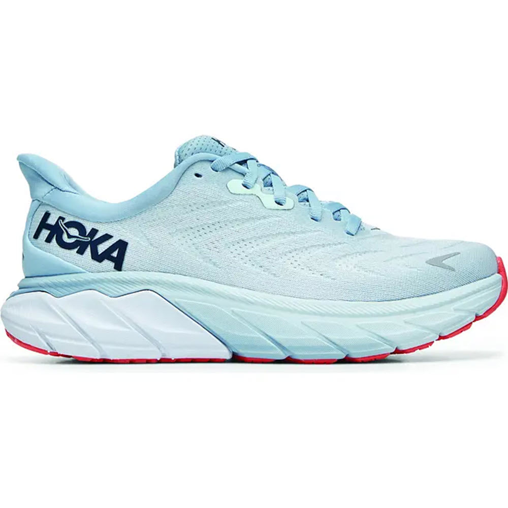 A light blue HOKA ONE ONE Arahi 6 stability running shoe with a white sole and branding on the side, designed for overpronators.