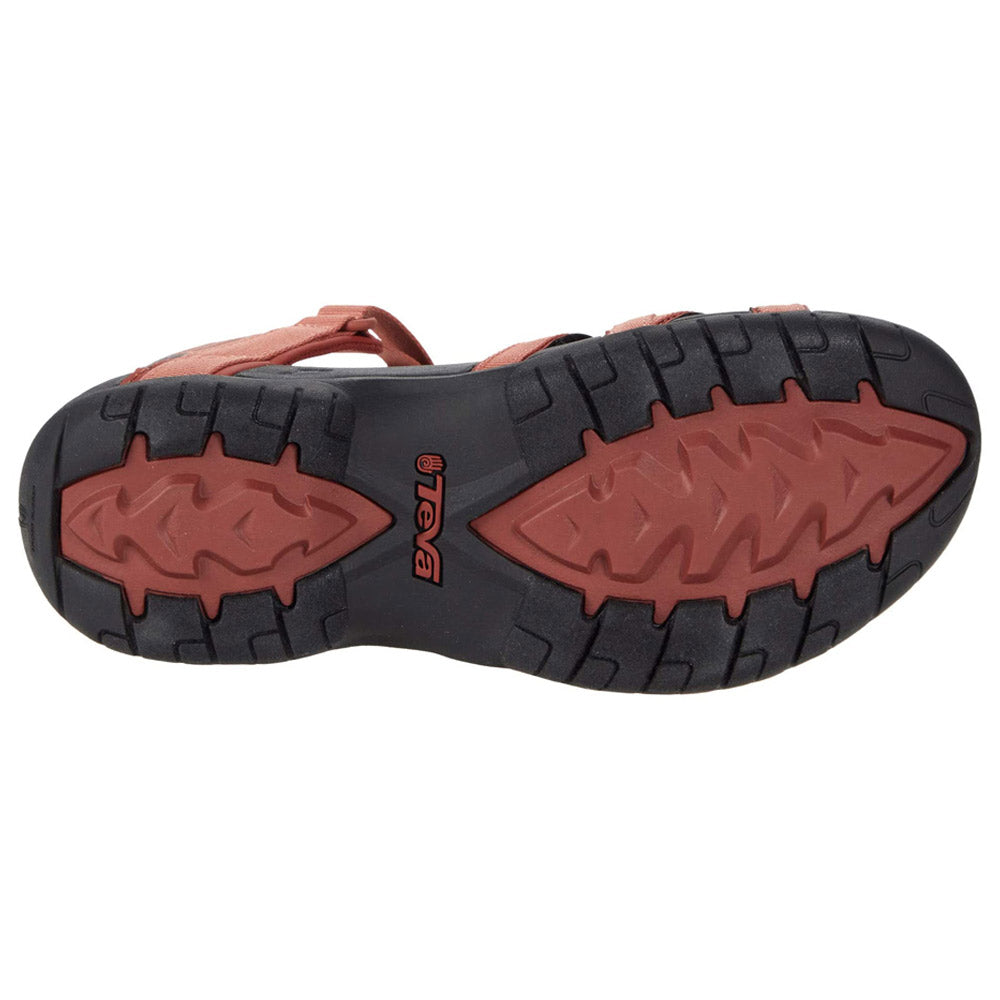 Sole of a brown Teva Tirra Aragon hiking sandal with a black tread pattern.