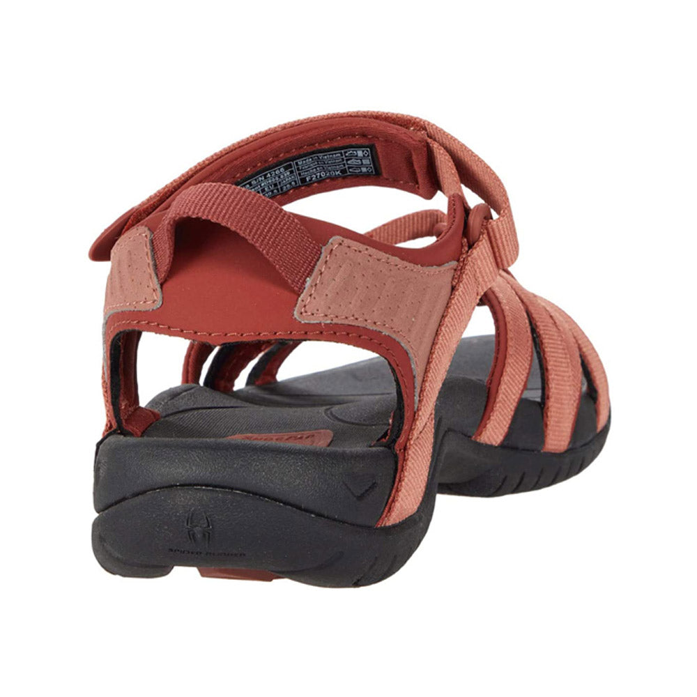 A pair of red Teva Tirra Aragon sports sandals against a white background.