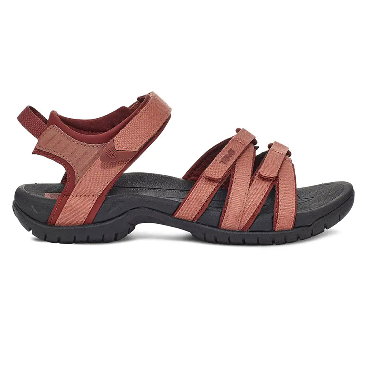 A pair of brown Teva Tirra Aragon vegan sandals on a white background.