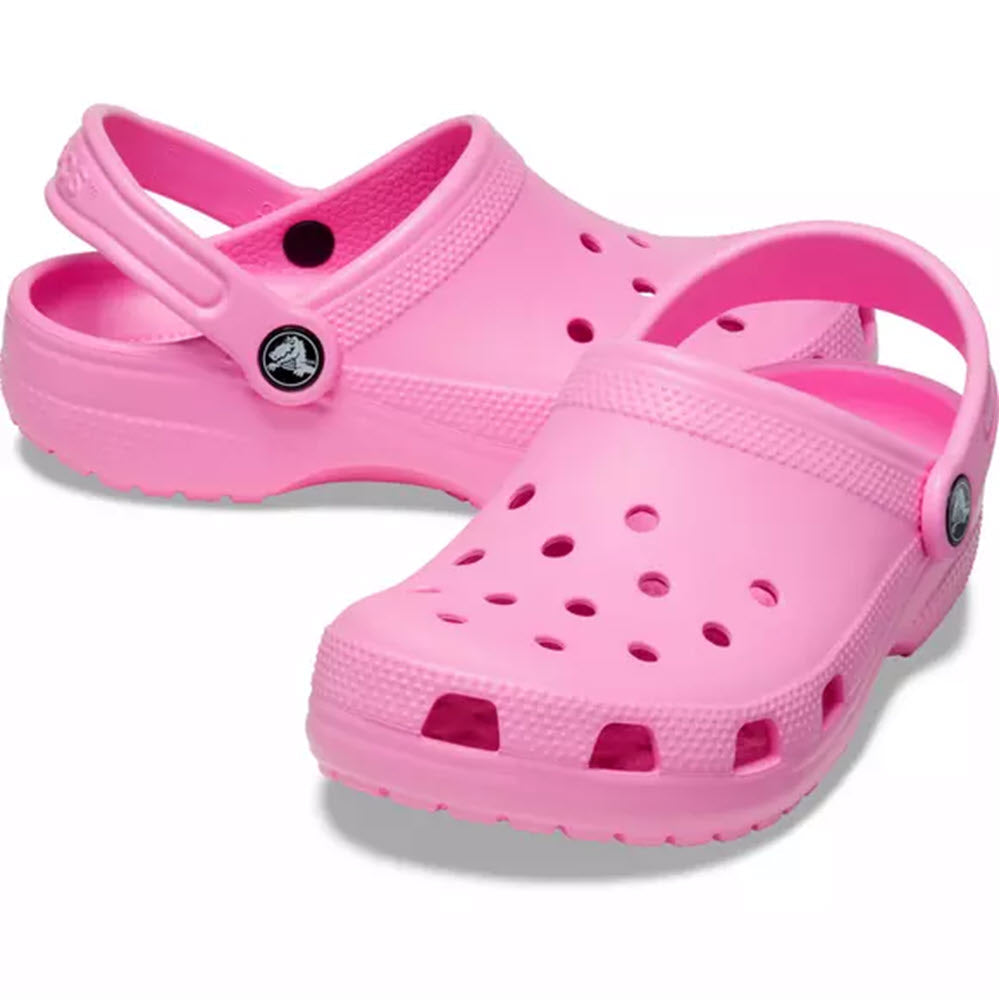 A pair of Crocs Classic Taffy Pink - Womens shoes on a white background.