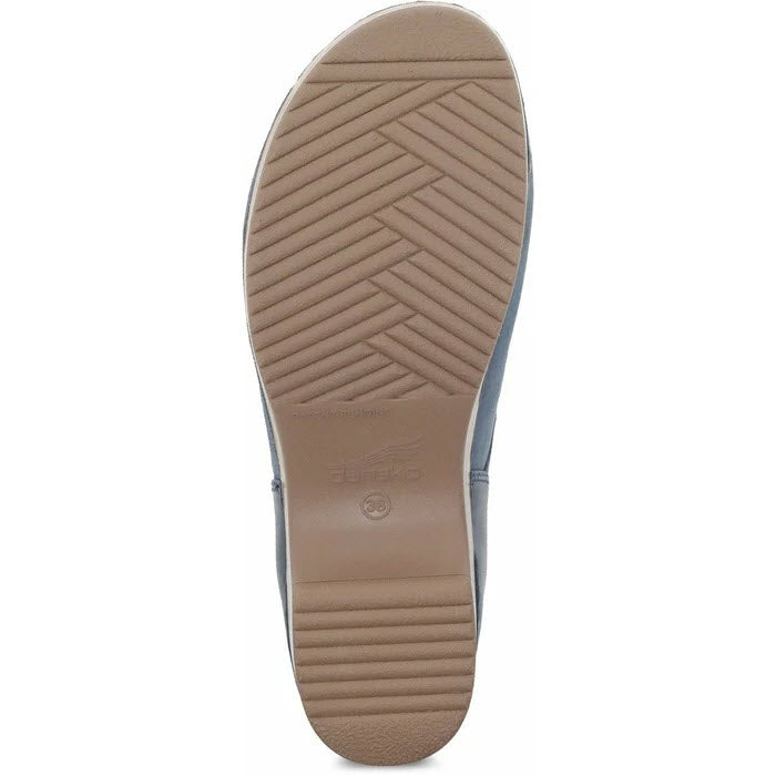 A lightweight EVA outsole shoe with a herringbone tread pattern, like the Dansko Brenna Navy Burnished - Womens.