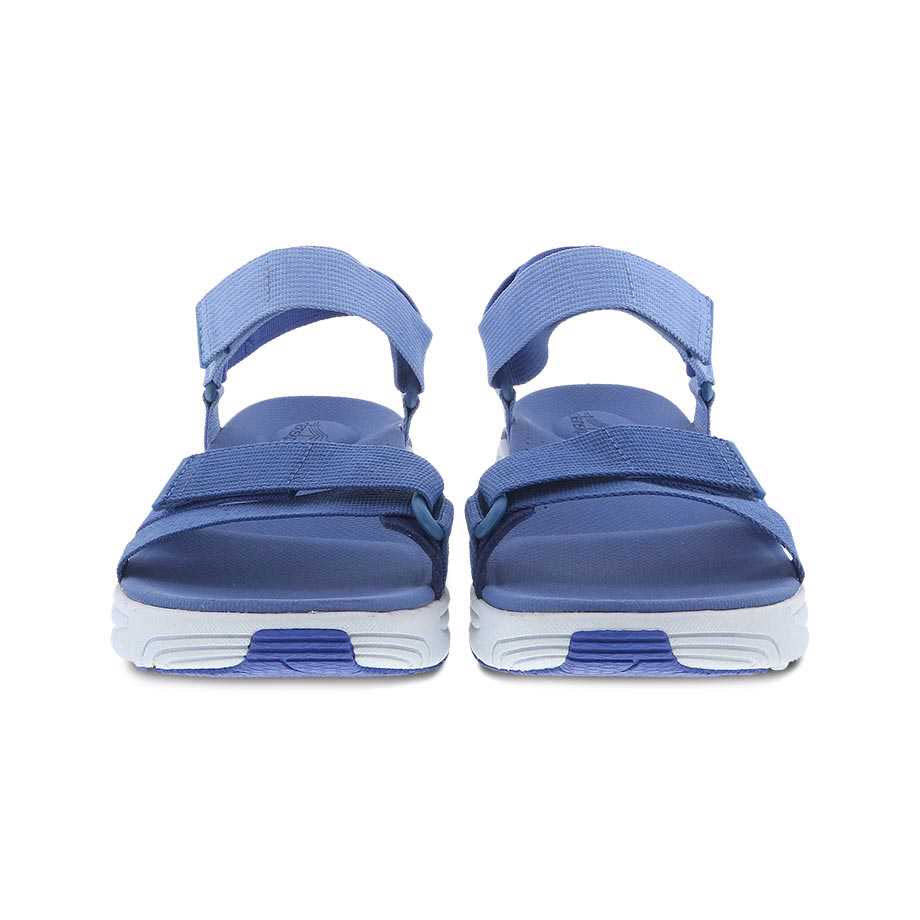 A pair of blue Dansko Racquel Blue Multi Webbing sport sandals with adjustable straps, viewed from behind.