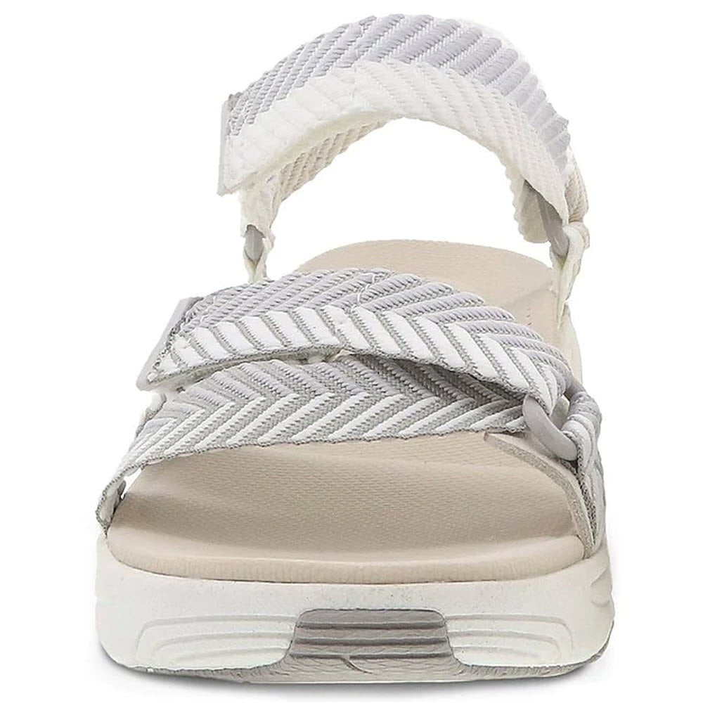 A DANSKO RACQUEL SAND HARRINGBONE WEBBING - WOMENS with thick, crisscrossing straps and a chunky sole.