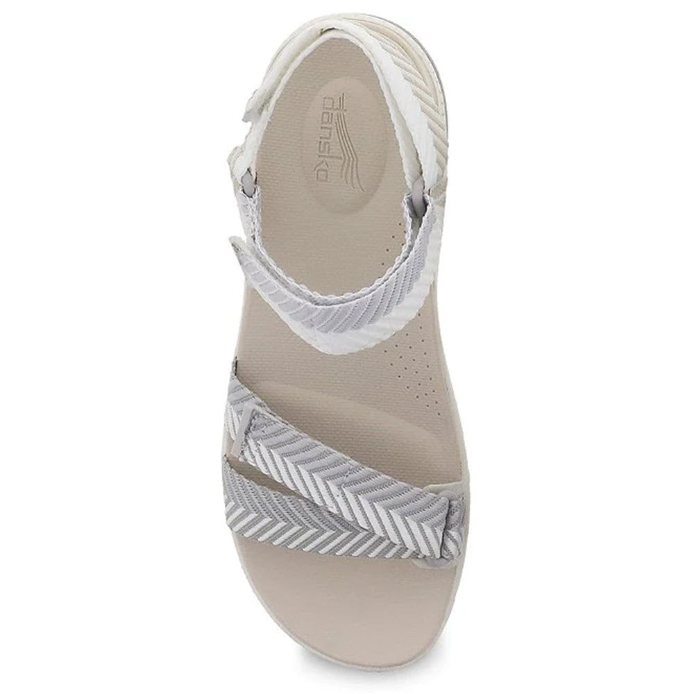 Dansko Racquel sandal with Natural Arch Technology in beige and gray herringbone webbing on a white background.