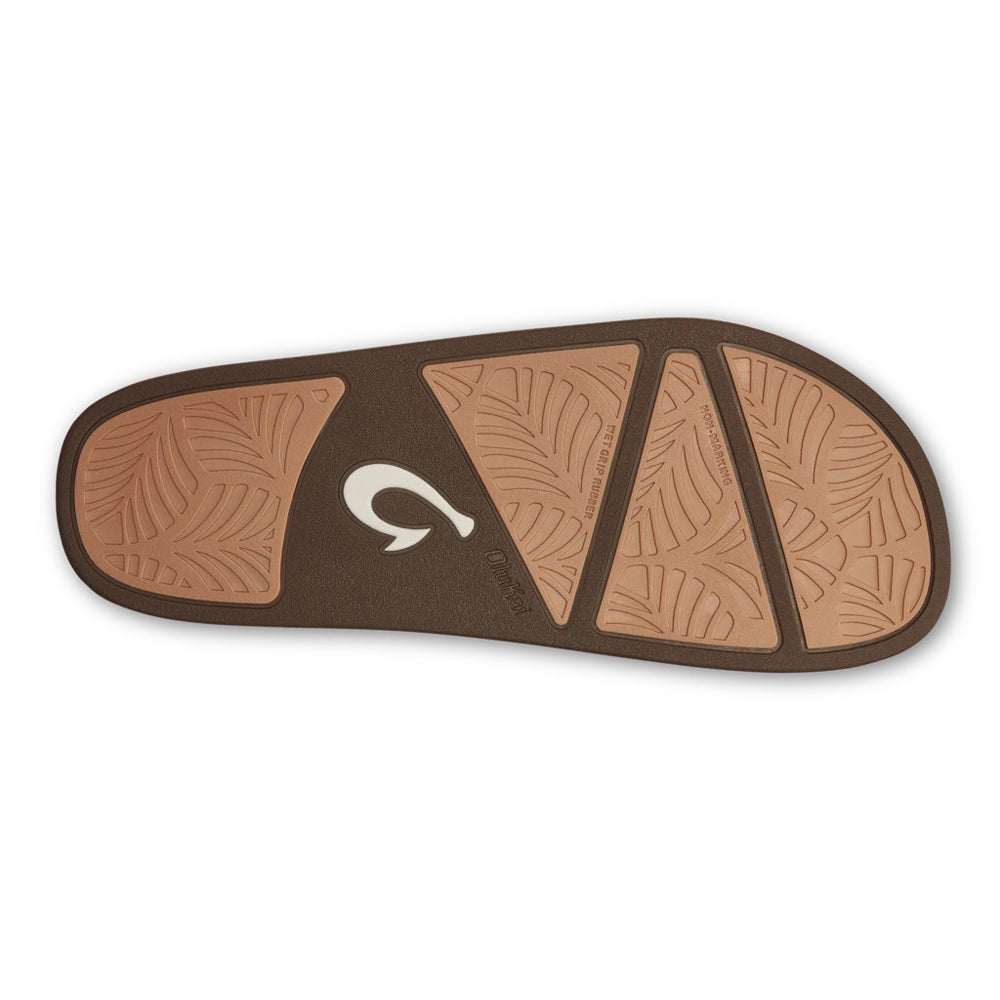 Brown Olukai Kipe&#39;a Heu Tapa insole with segmented cushioning and a logo on the heel area.