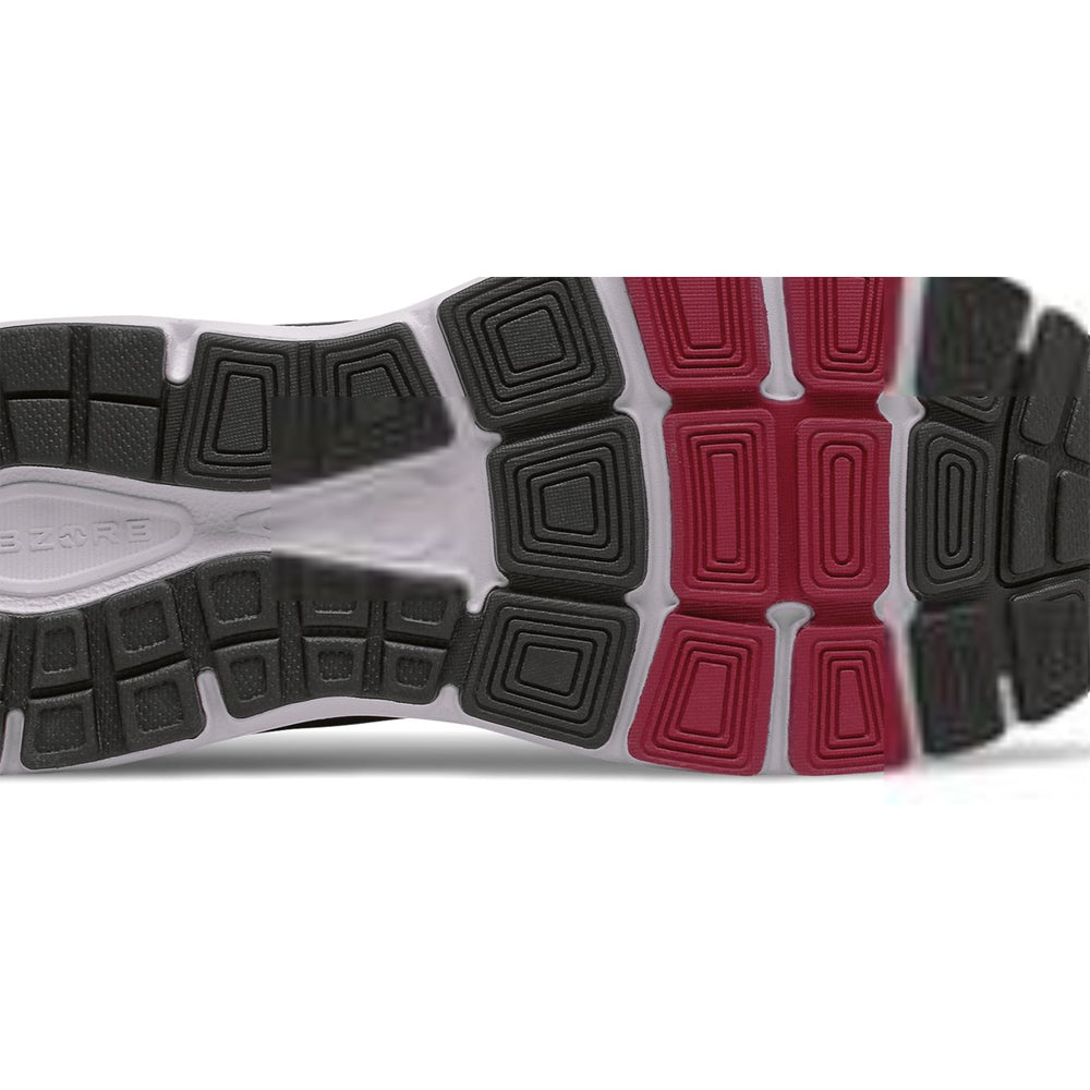 Close-up of a men&#39;s athletic shoe sole featuring a black and red tread pattern with New Balance 840V5 ABZORB midsole technology.