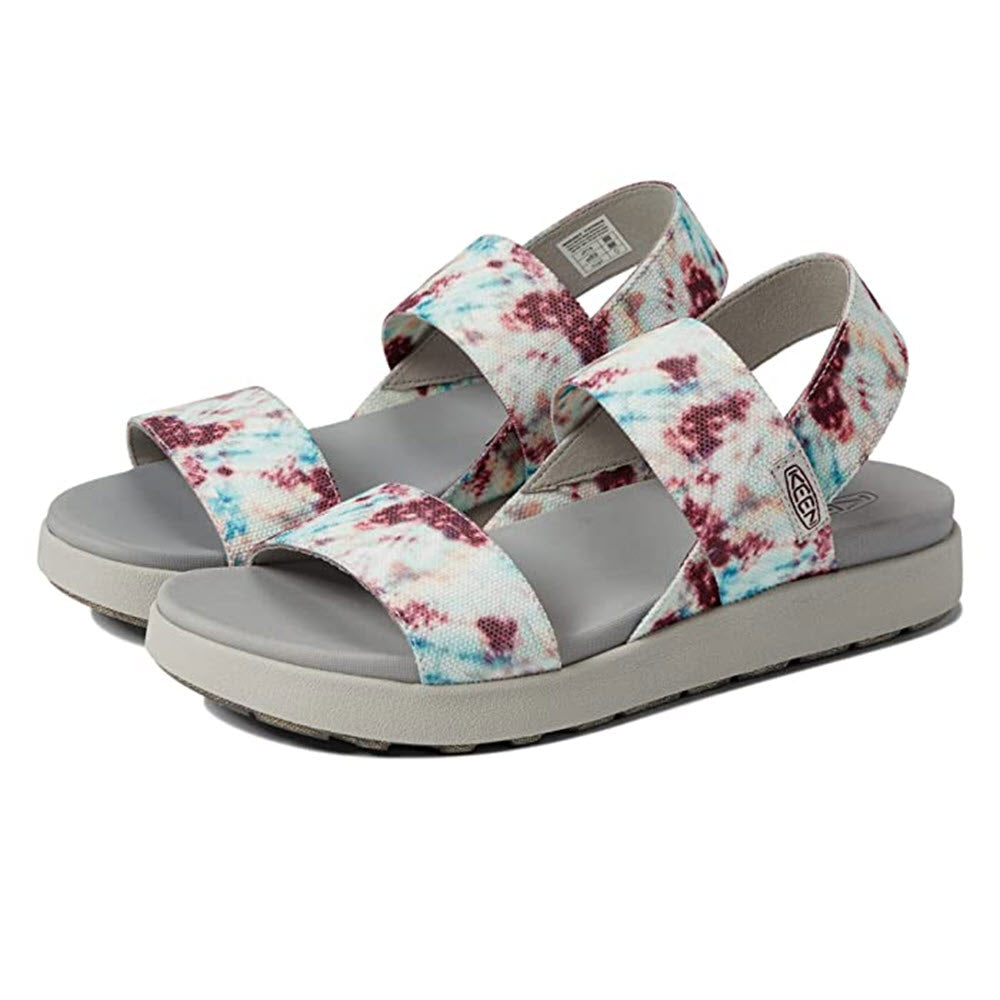 A pair of Keen ELLE BACKSTRAP ANDORRA TIE DYE - Women&#39;s sandal with adjustable straps, crafted from eco-friendly materials including recycled plastic bottles.