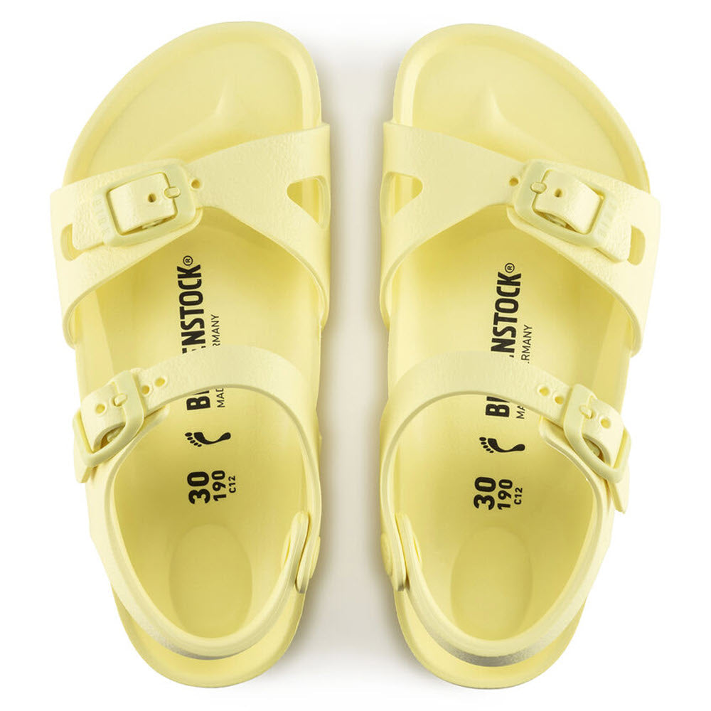 A pair of yellow Birkenstock Rio EVA Popcorn sandals, viewed from above, made from lightweight EVA.