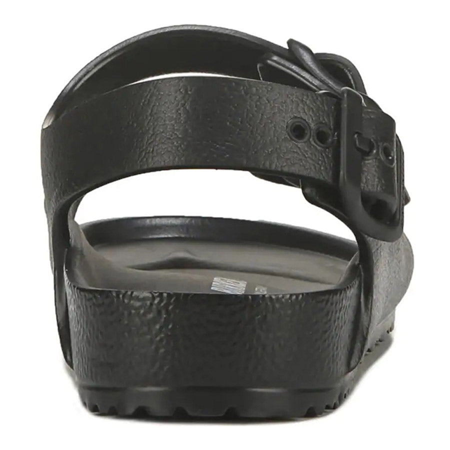 BIRKENSTOCK MILANO EVA BLACK - KIDS leather belt with a metal buckle, coiled and isolated against a white background, styled with an anatomically shaped footbed.