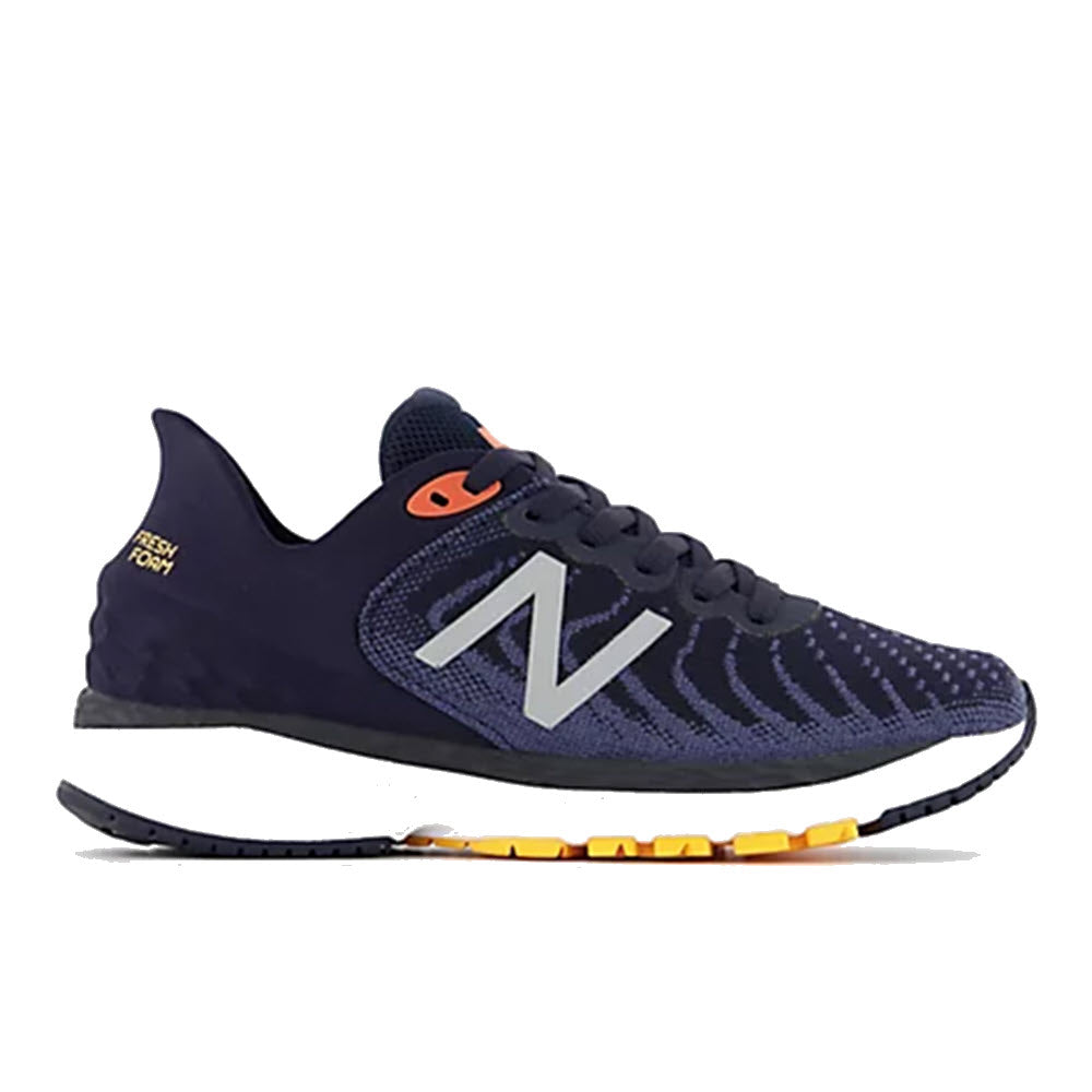 Side view of a blue New Balance Fresh Foam 860v11 Spring Tide running shoe with orange accents, designed for the stability-minded runner.