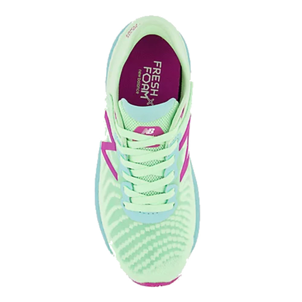 Top-down view of a single green and purple New Balance Fresh Foam 860v11 Vibrant Spring Glo athletic shoe with white laces.