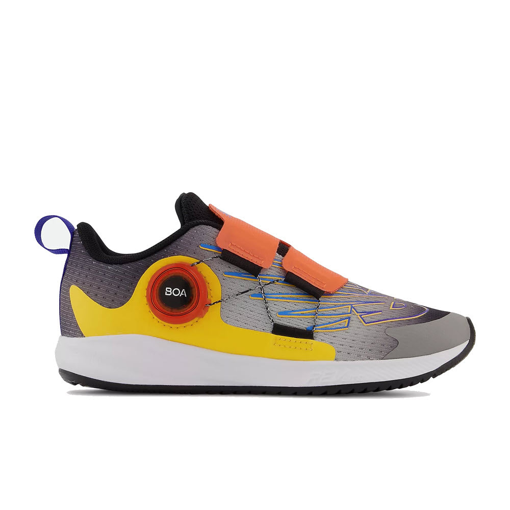 A color-blocked kids' running shoe with a New Balance FuelCore Reveal BOA lacing system.