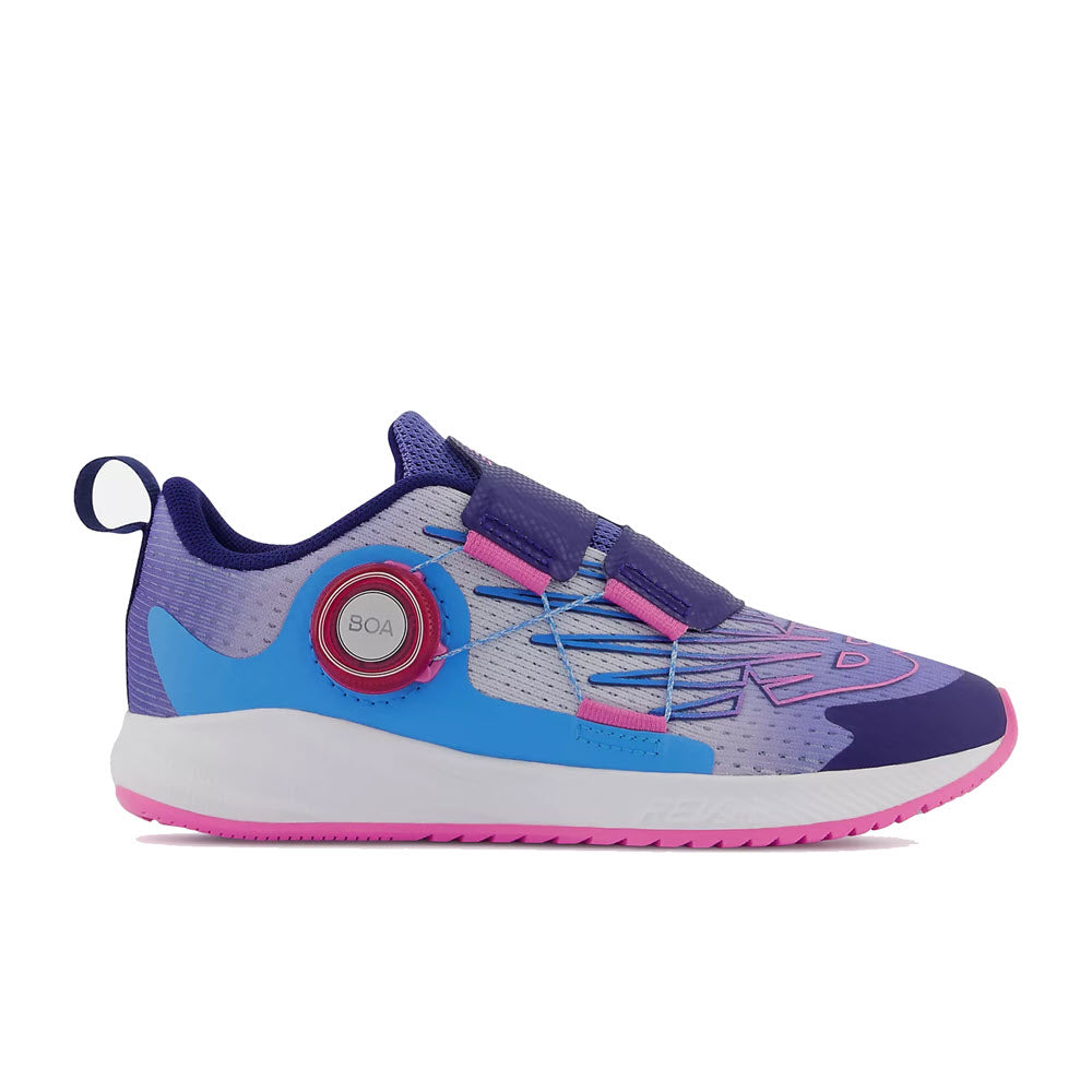 A colorful child&#39;s athletic shoe featuring the New Balance FUELCORE REVEAL BOA VIBRANT VIOLET - KIDS.