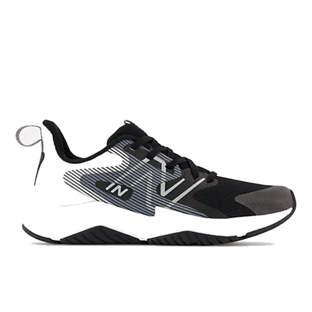 A single New Balance Rave Run V2 black and white kids’ running shoe on a white background.