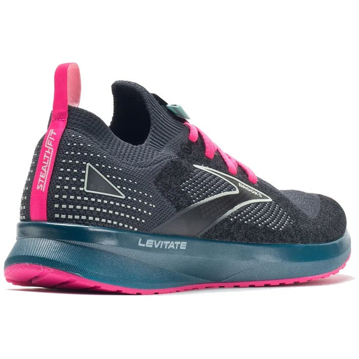 Side view of a black and pink women&#39;s Brooks Levitate StealthFit 5 running shoe with the word &quot;Brooks&quot; on the sole.