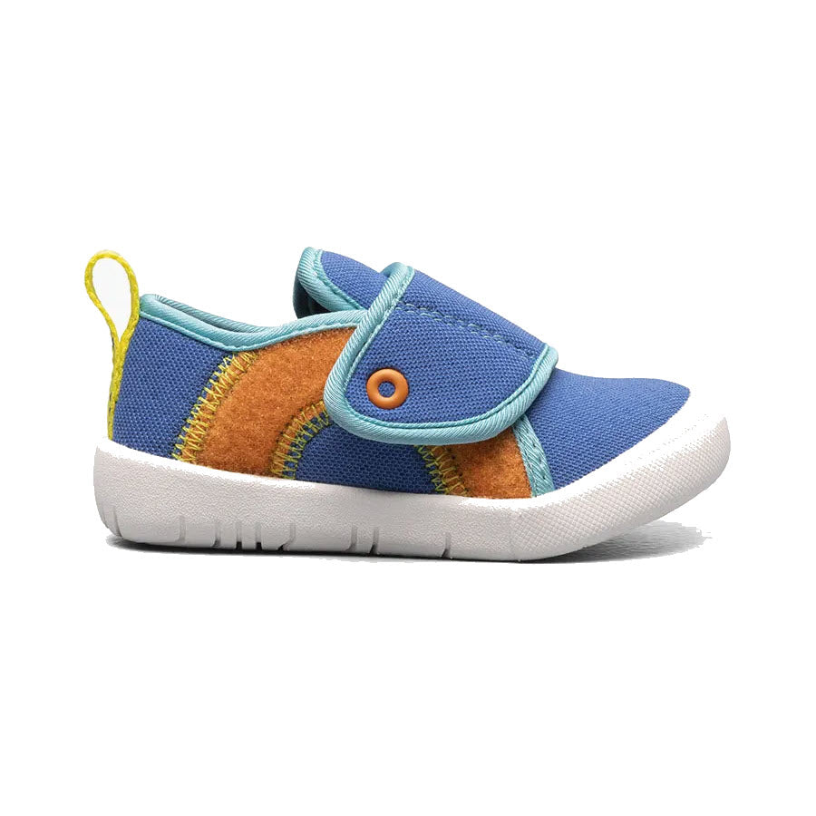 Blue and brown Bogs children&#39;s sneaker with a velcro strap, flexible sole, and white sole.