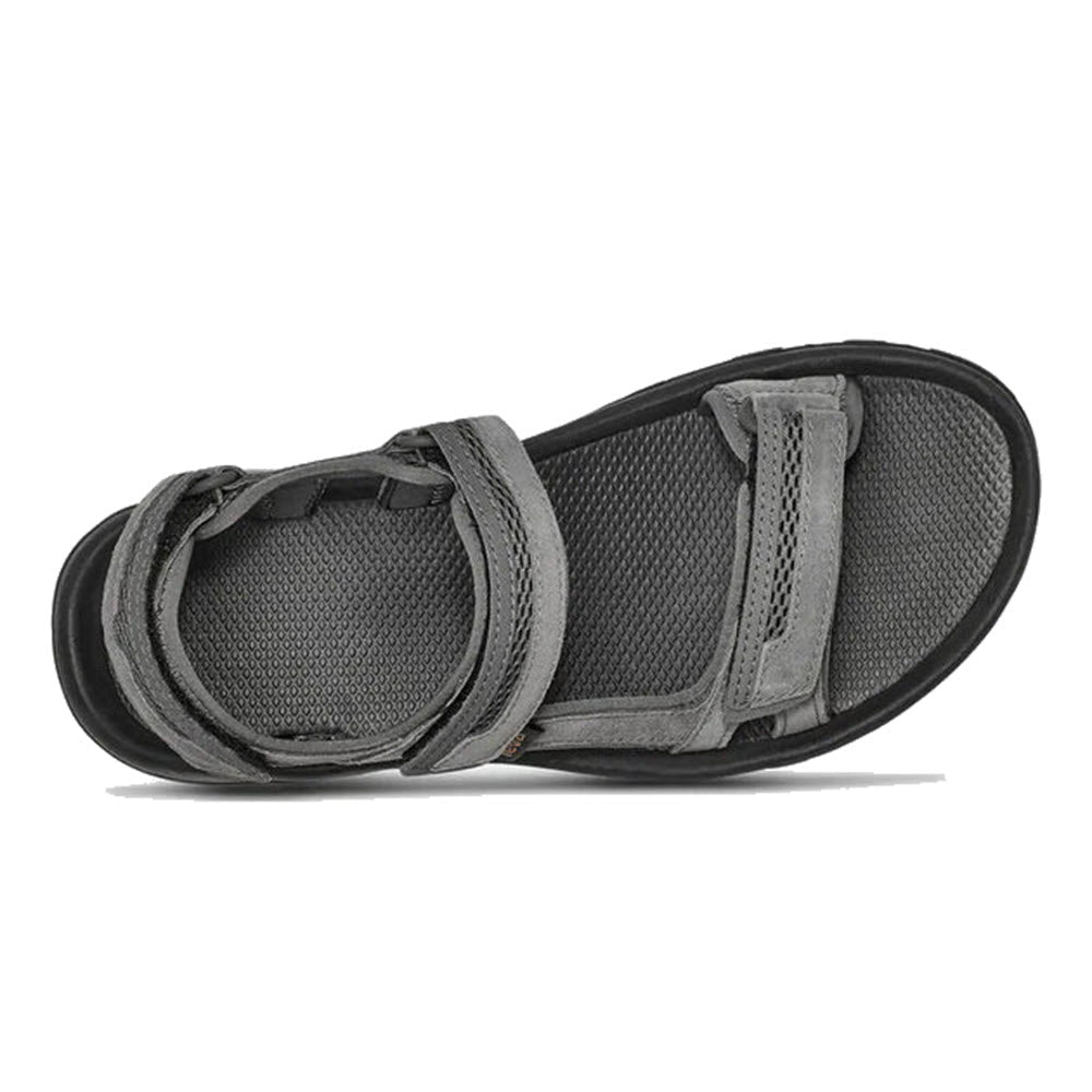 A single Teva Hudson Dark Gull Grey - Mens sport sandal with hook &#39;n&#39; loop adjustment straps and a textured inner sole, displayed on a white background.