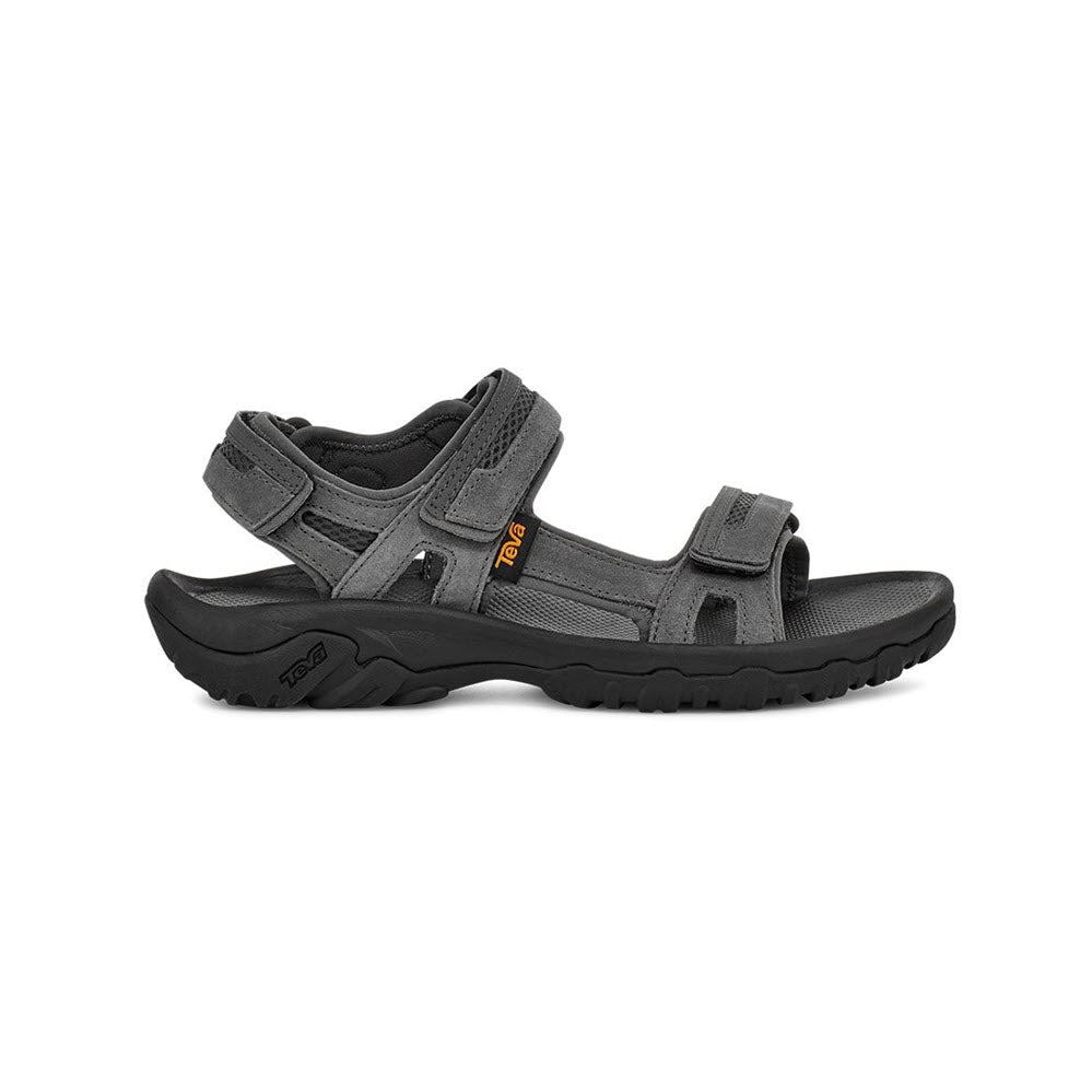 A pair of gray Teva Hudson sports sandals with hook &#39;n&#39; loop adjustment straps on a white background.