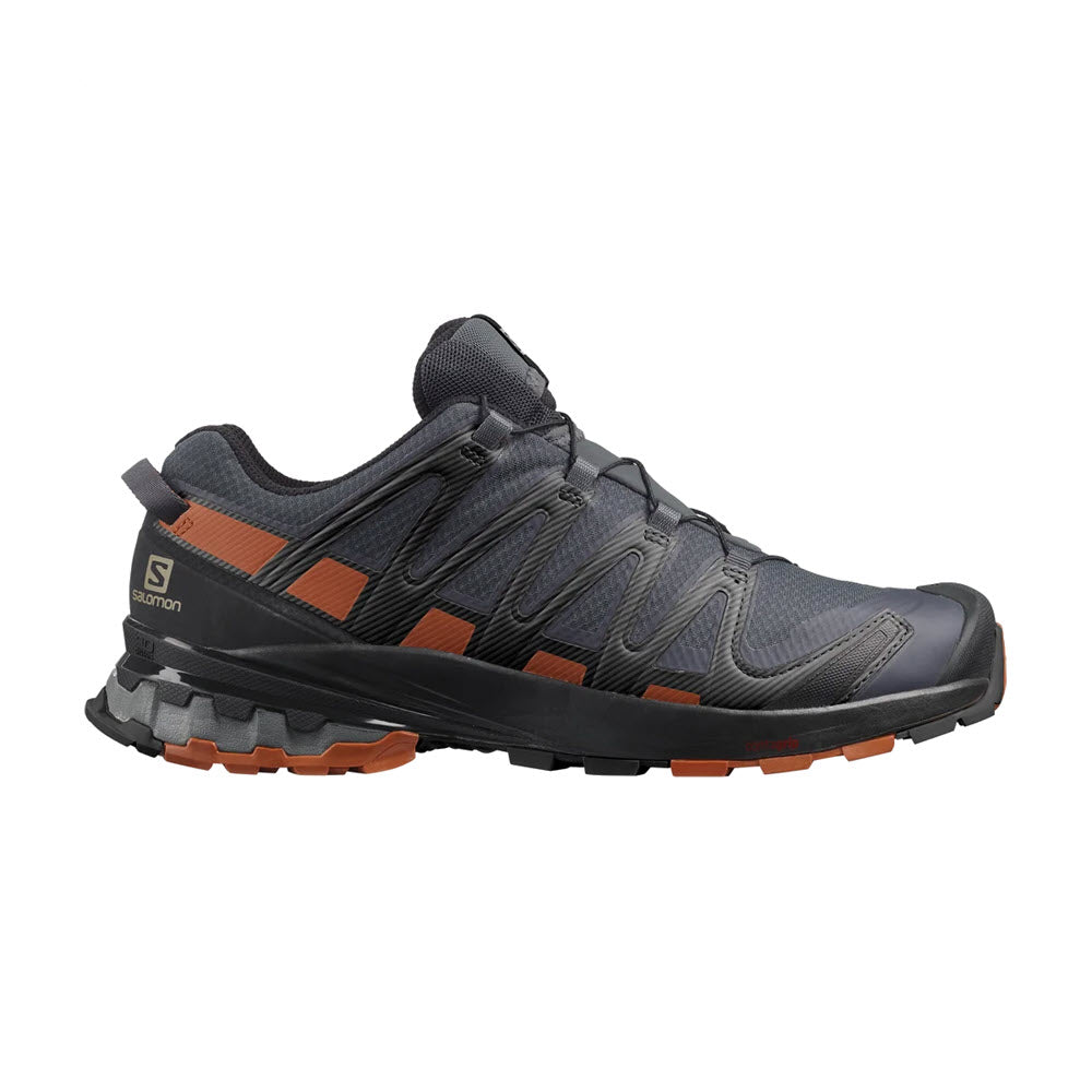 Side view of a Salomon SALOMON XA PRO 3DV8 GTX EBONY/CARAMEL CAFE/BLACK men&#39;s trail running shoe in gray with orange and black accents, featuring an aggressive tread sole.