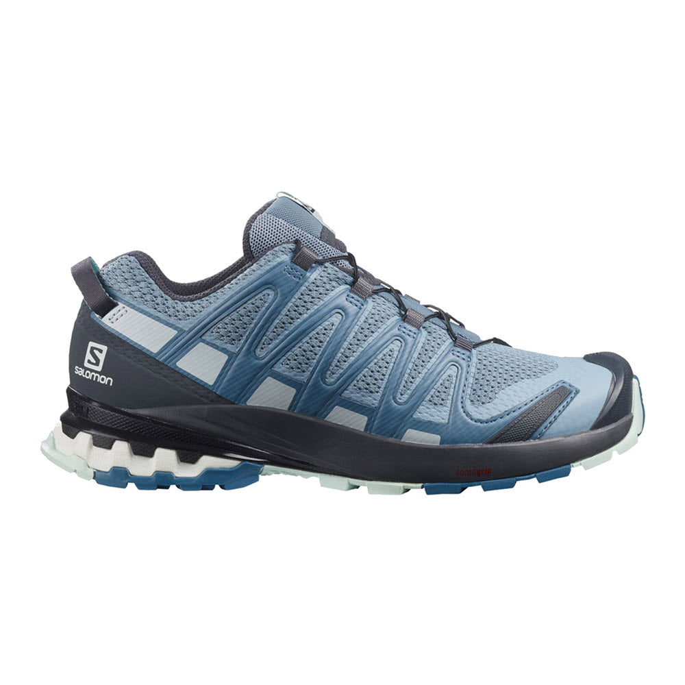 Side view of a Salomon SALOMON XA PRO 3D V8 BLUE/EBONY - WOMENS trail running shoe in blue and gray colors, featuring a rugged Contagrip sole and quick-lace system.