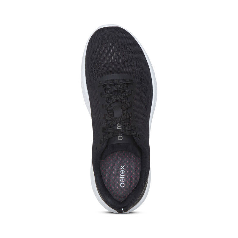 Top view of a single Aetrex Danika Black women&#39;s athletic sneaker with arch support on a white background.