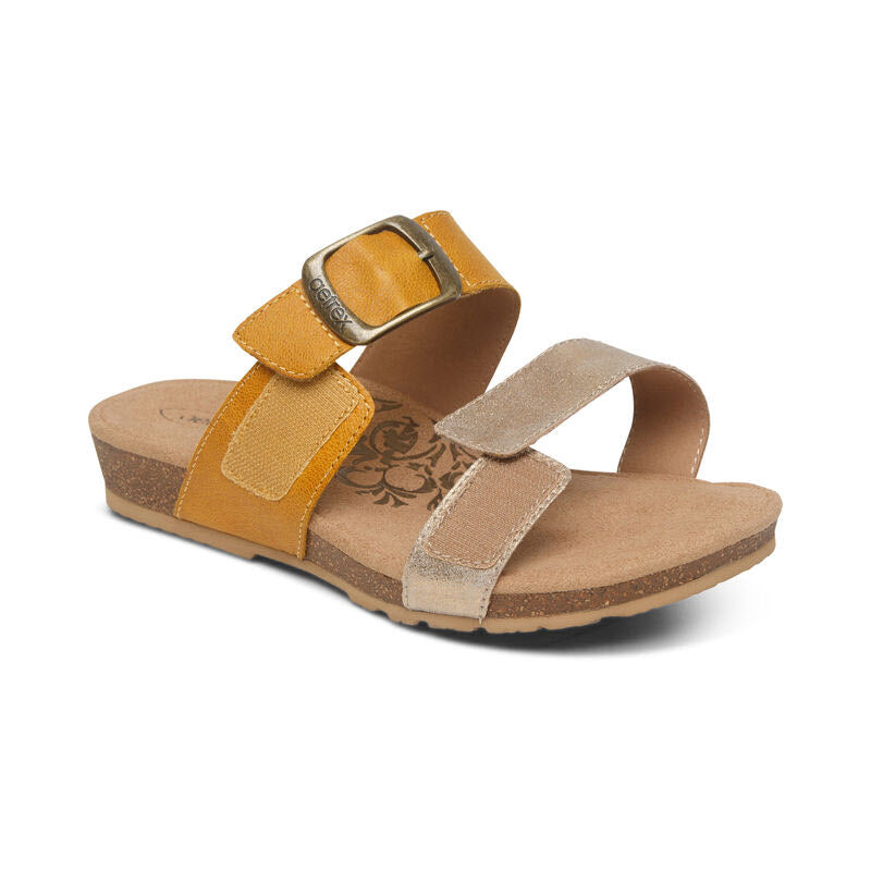 A single Aetrex Daisy Sunflower - Womens sandal with adjustable straps on a white background.