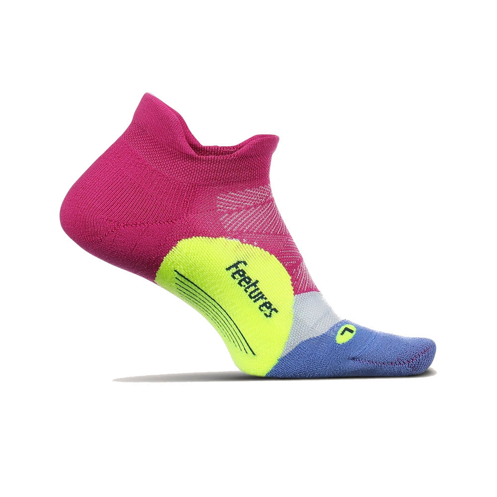 Colorful Feetures Elite Ultra Light No Show Tab Pulse Purple sock with a gradient from blue to purple and a neon yellow toe area, featuring arch support and the Feetures logo on the side.