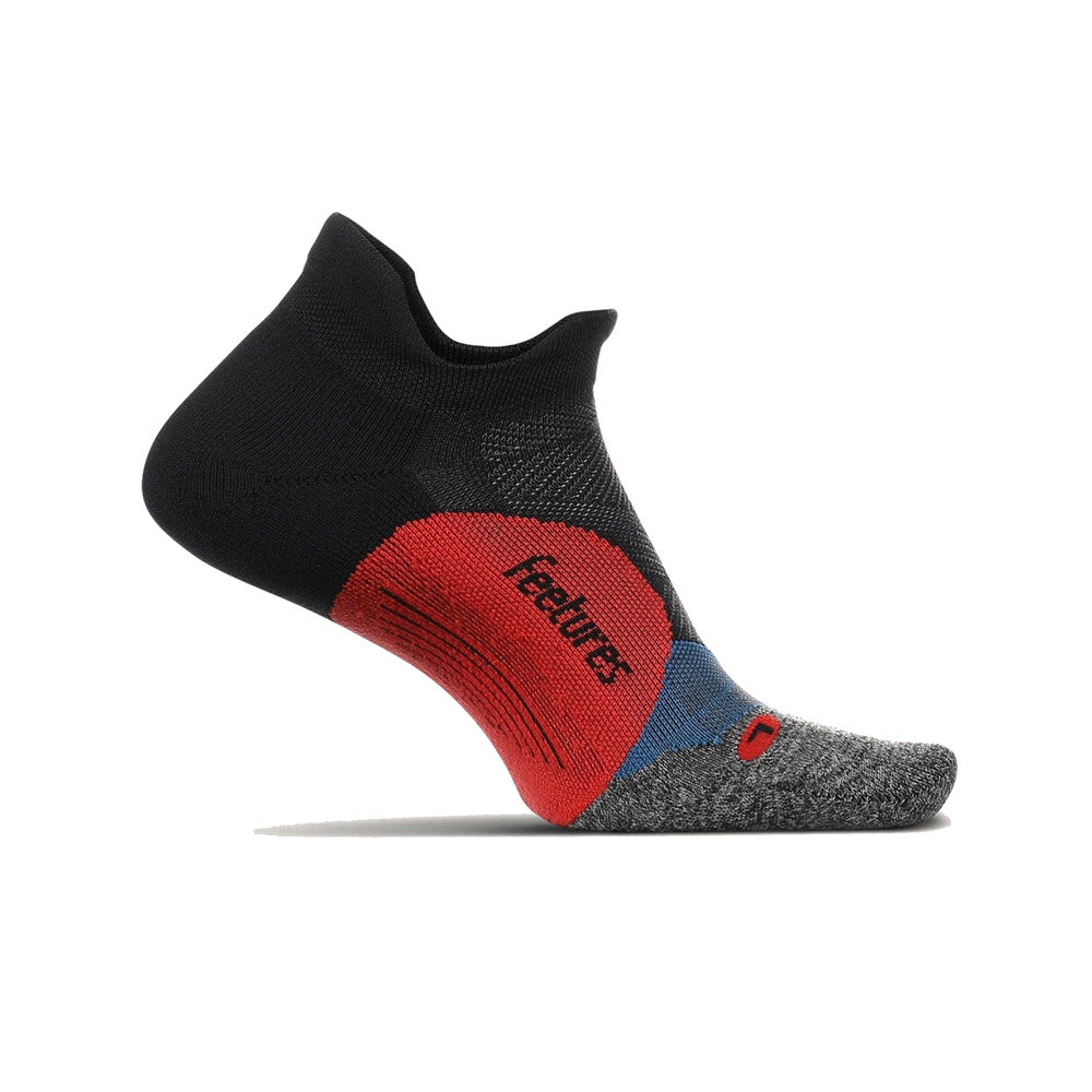 A single Feetures Elite Max Cushion No Show Sock Tab in black with a red section and the word &#39;Feetures&#39; written on the side, displayed against a white background.