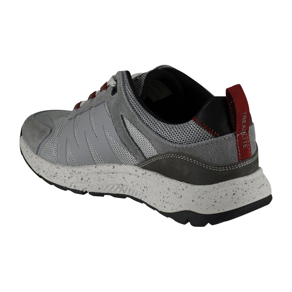 Side view of a Florsheim Tread Lite Mesh Lace Gray athletic shoe with a speckled white Comfortech sole on a white background.