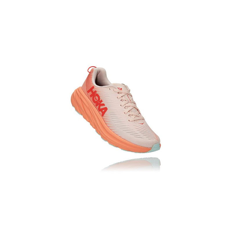 A single peach-colored running shoe with the word &quot;HOKA ONE ONE RINCON 3&quot; on the side.