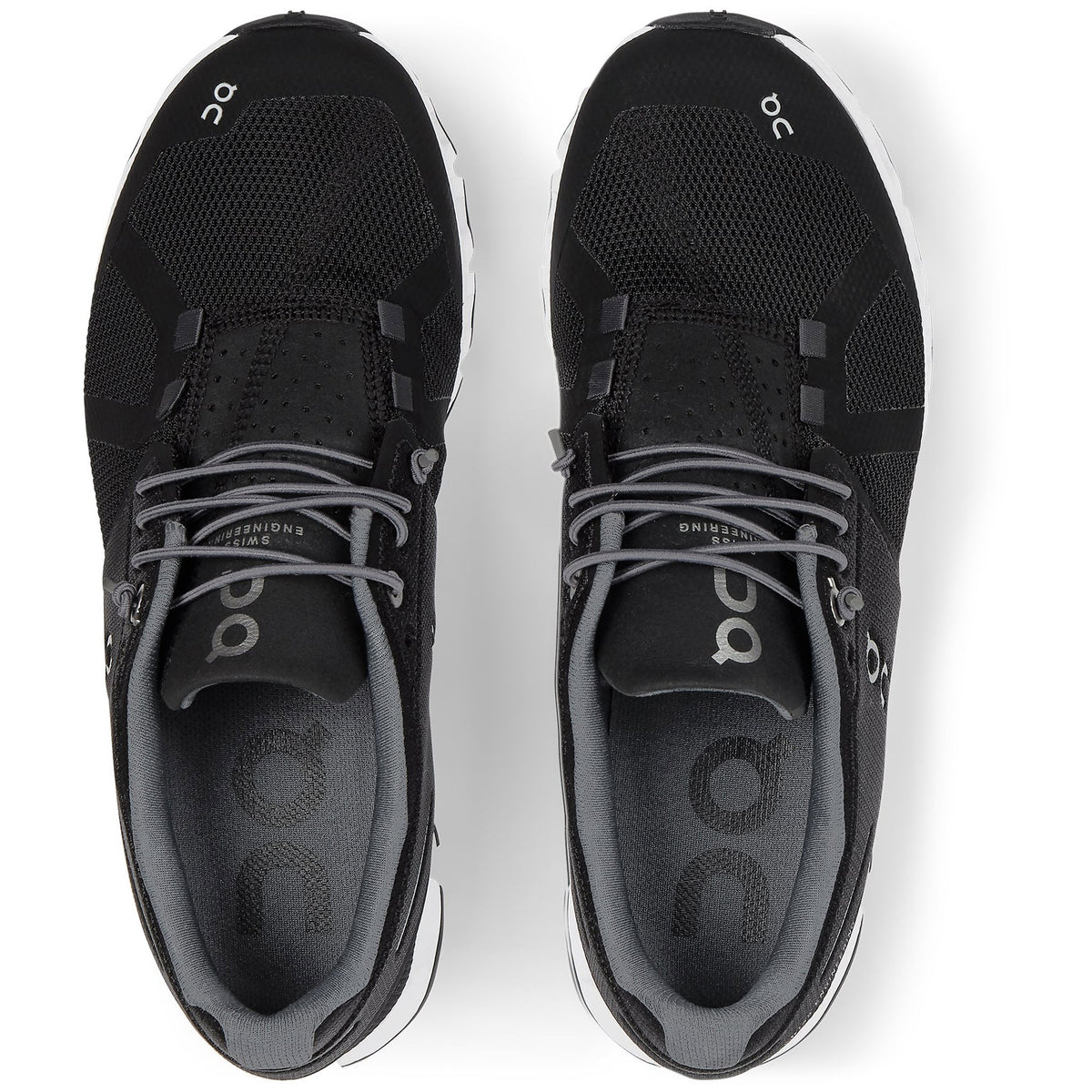 Top-down view of a pair of black On Running Cloud running shoes with a breathable mesh upper.