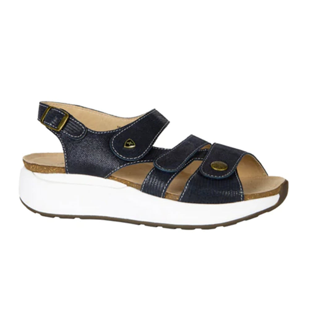Xelero Mykonos Navy Embossed Leather sandal with adjustable straps, extra deep footbeds, and a white sole.