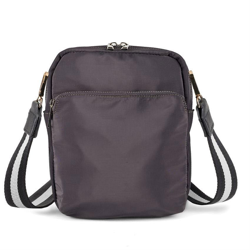 Compact gray COCO & CARMEN BENUCCHI crossbody bag with guitar strap and front zipper pocket.