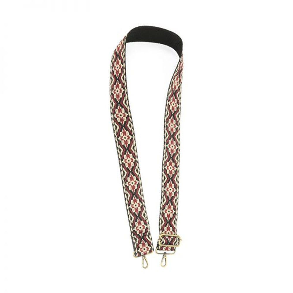Patterned fabric suspenders with embroidered boho patterns on a white background from Joy Susan.