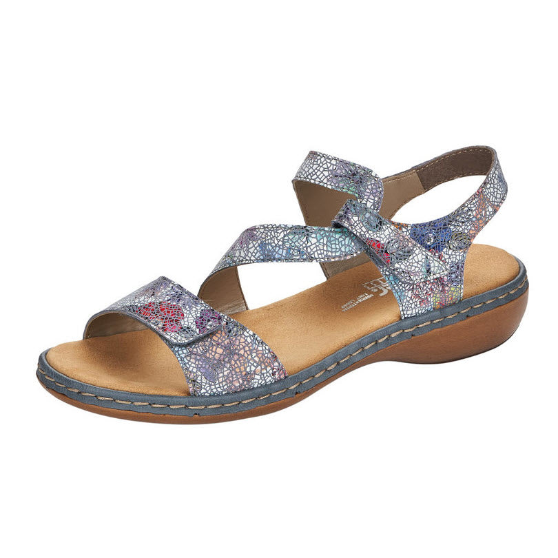 Patterned women&#39;s Rieker strappy sandals with Velcro straps on a white background.