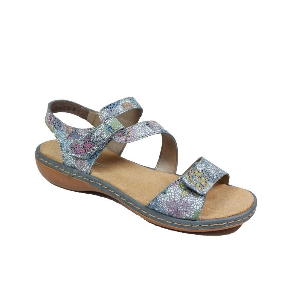 Glittery multicolored Rieker 659C7 sandals with Velcro straps on a white background.