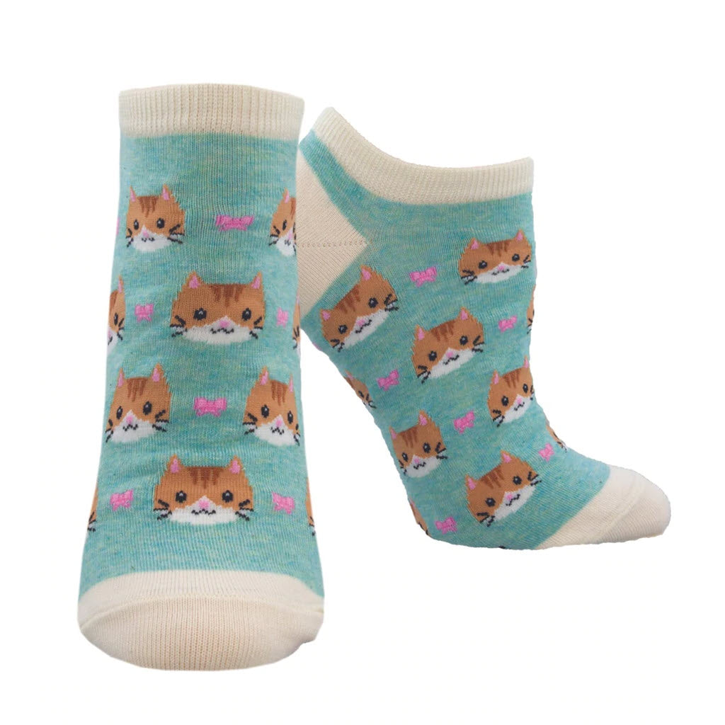 A pair of SOCKSMITH HEARTY KITTY SOCKS BLUE with a cat lady face pattern, designed with love.