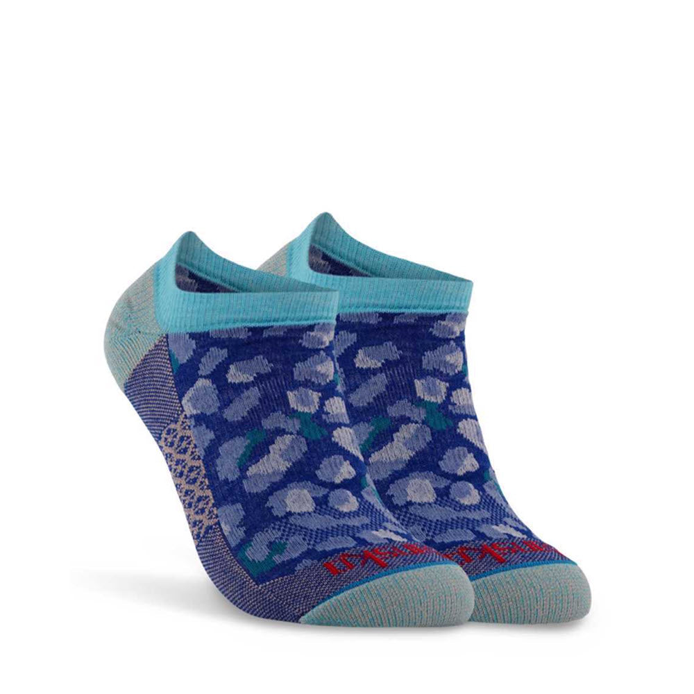 A pair of Dansko cobalt blue patterned comfort socks against a white background.