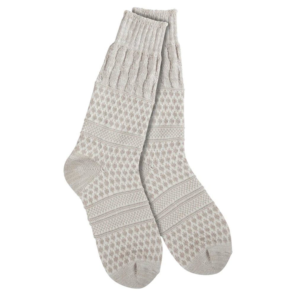 A pair of warm, beige patterned Worlds Softest Gallery Crew Socks Cloud - Womens displayed on a plain background.