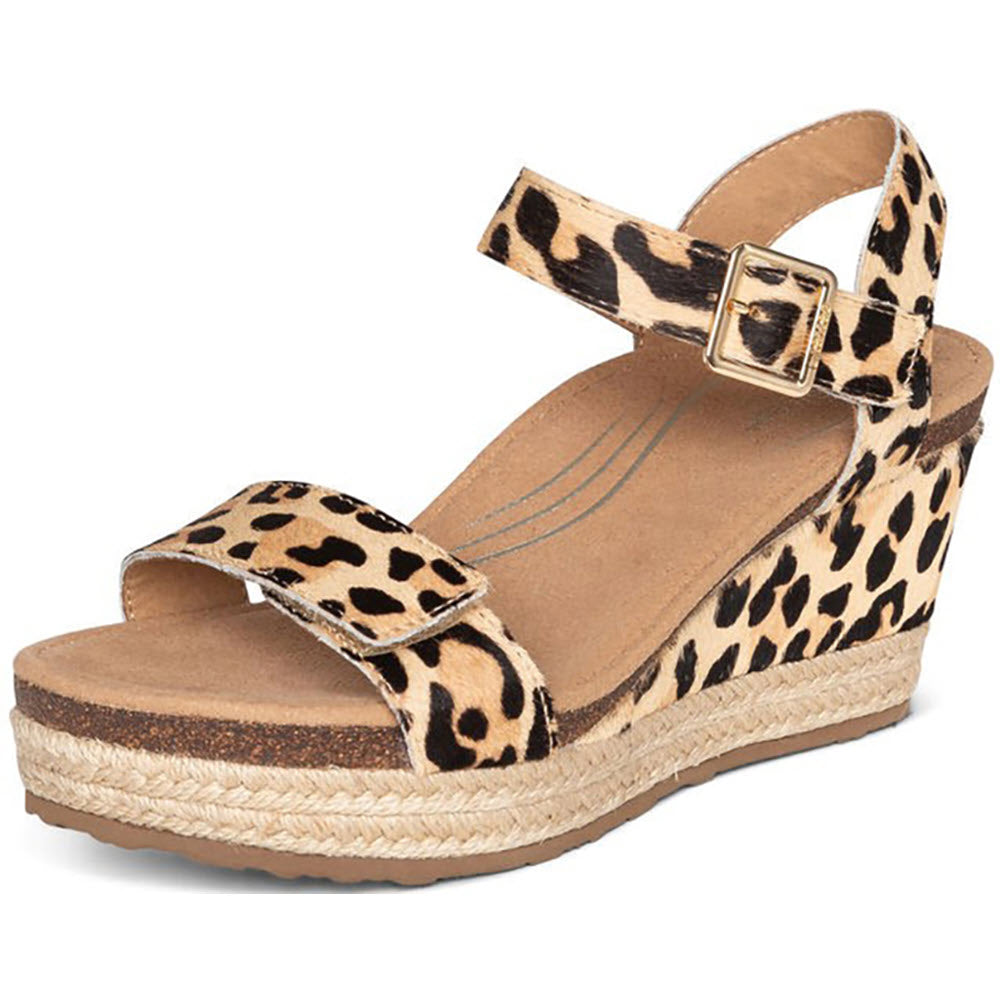 Sentence revised: Aetrex Sydney leopard print wedge sandal with ankle strap and arch support.