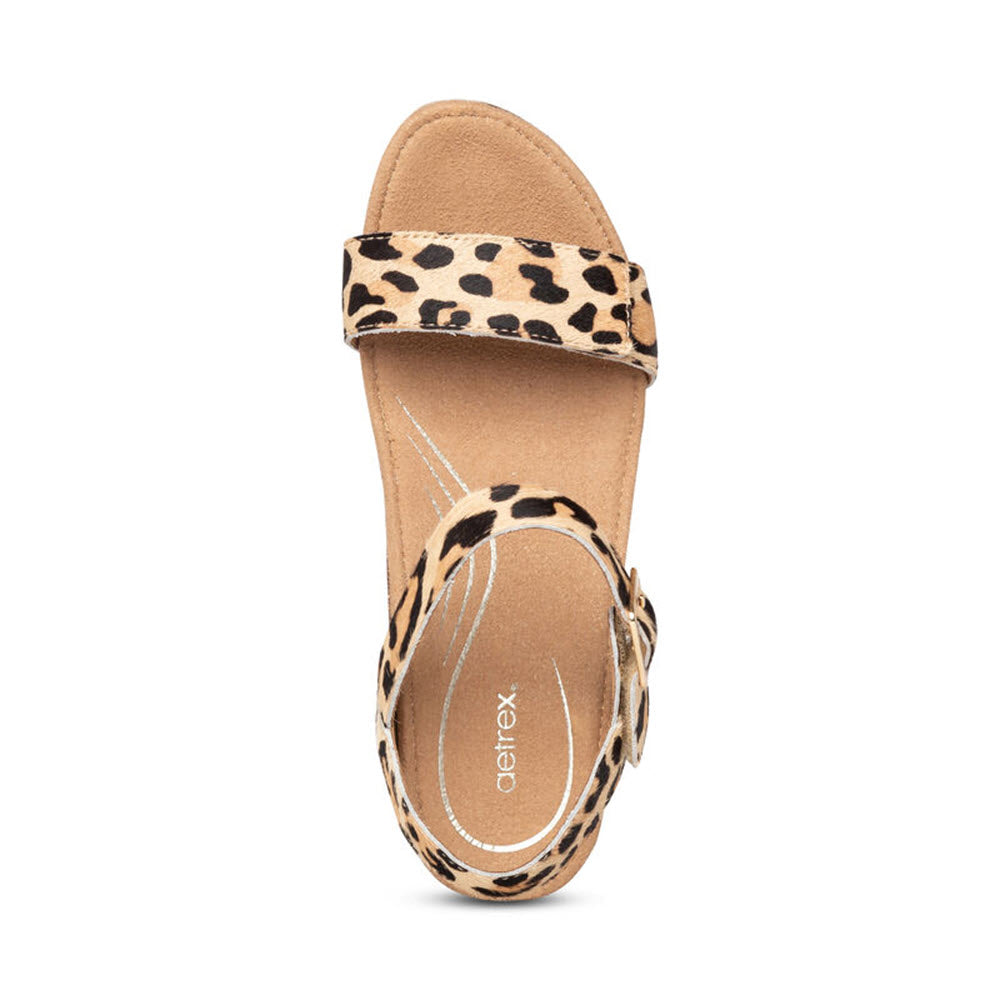 Aetrex Sydney leopard print sandal with arch support on a white background.