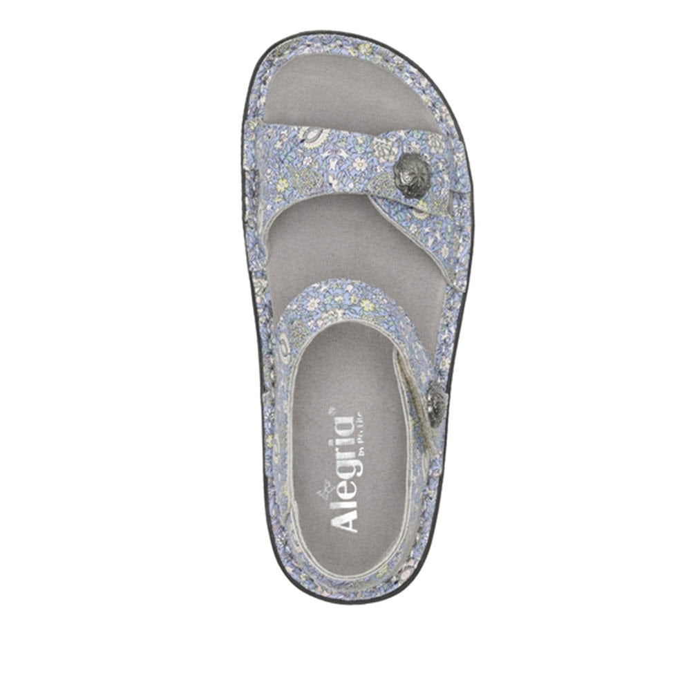 Top view of a floral-patterned Alegria Vienna Smooth Jazz slingback sandal.