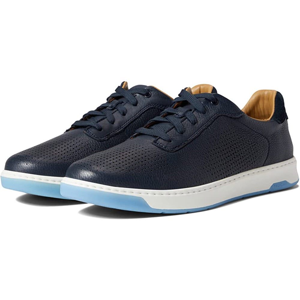 A pair of Johnston &amp; Murphy Daxton U-Throat Navy casual men&#39;s sneakers with TRUFOAM™ cushioning and white soles.